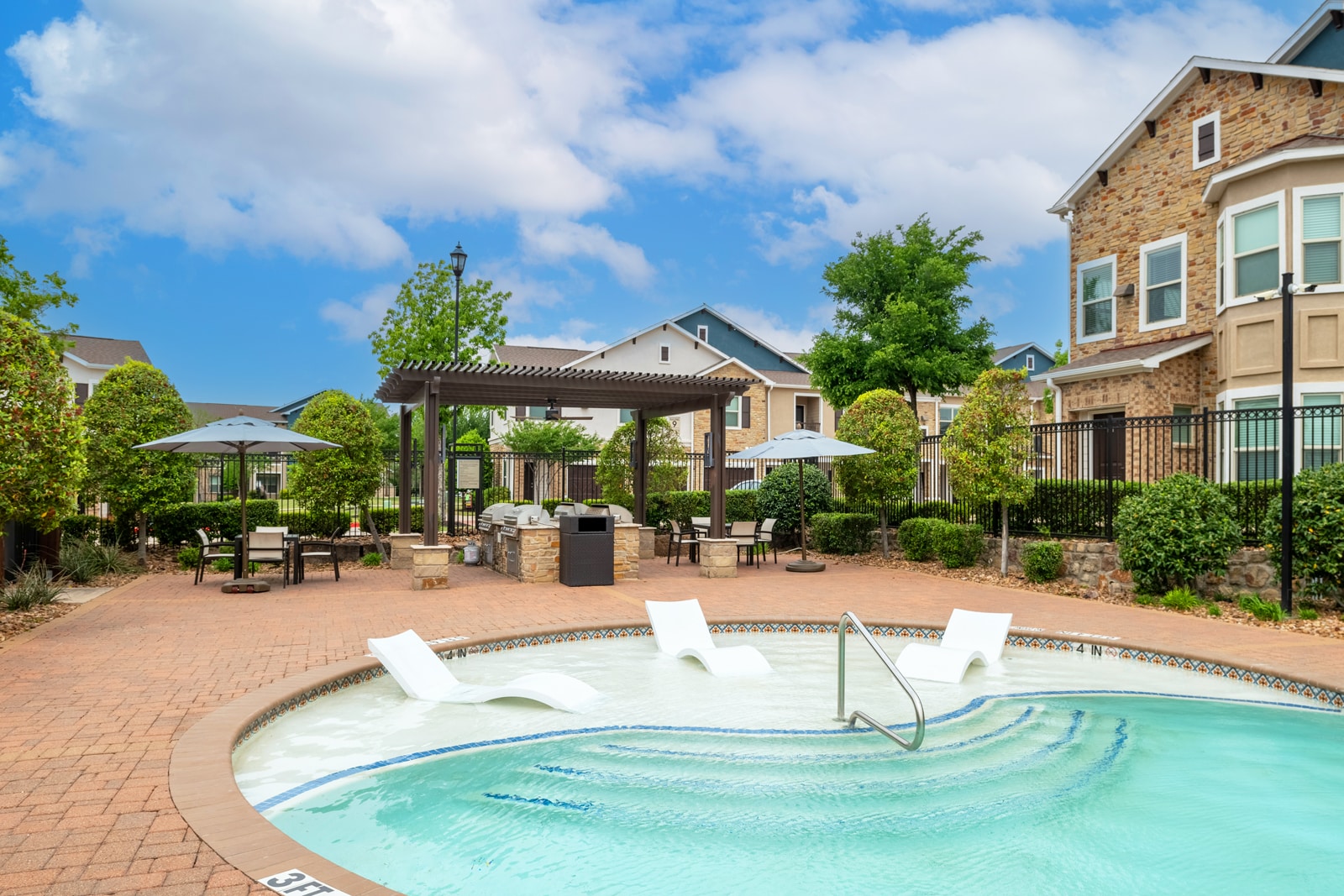 Windsong Estates at Prosper-POI-010 Relax by our resort-style pool at our Blue Ash apartments.